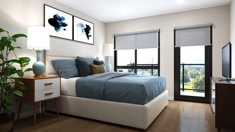 A bedroom with a bed, nightstand, and a plant.