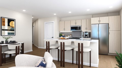 A modern kitchen with a dining table and chairs.
