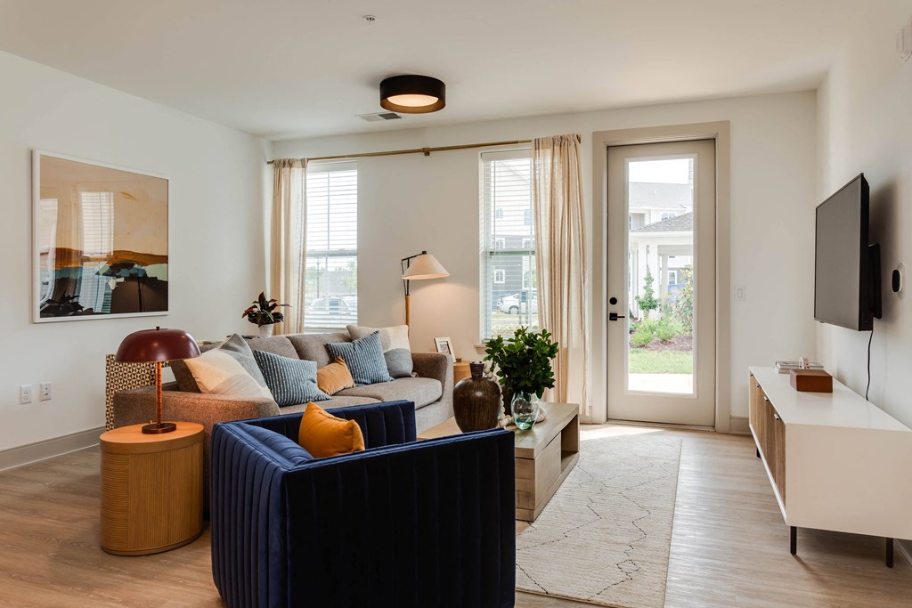 Expansive Common Areas with Beautiful Hardwood Flooring