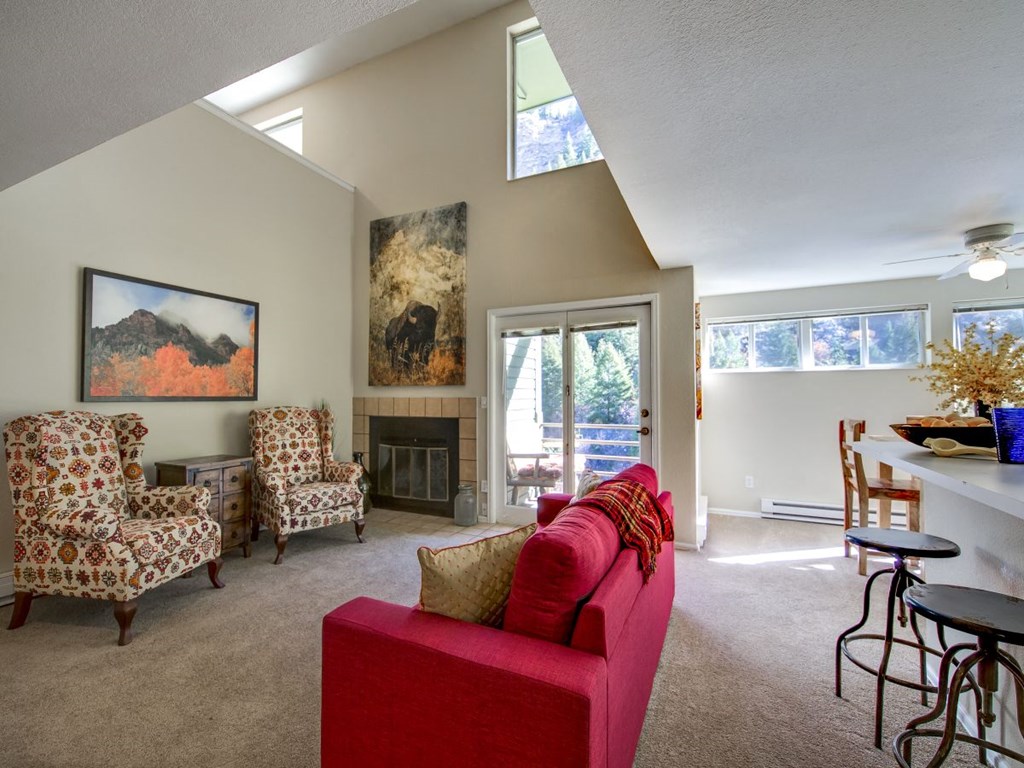 living room with red sofas