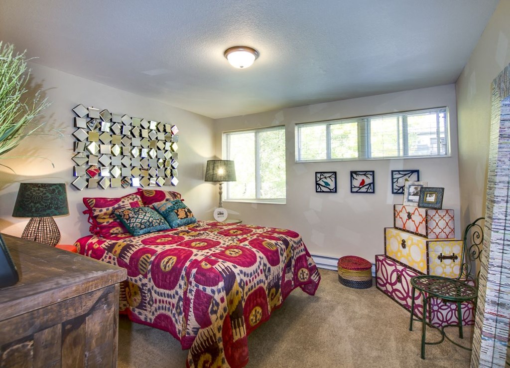 bedroom with red comforter