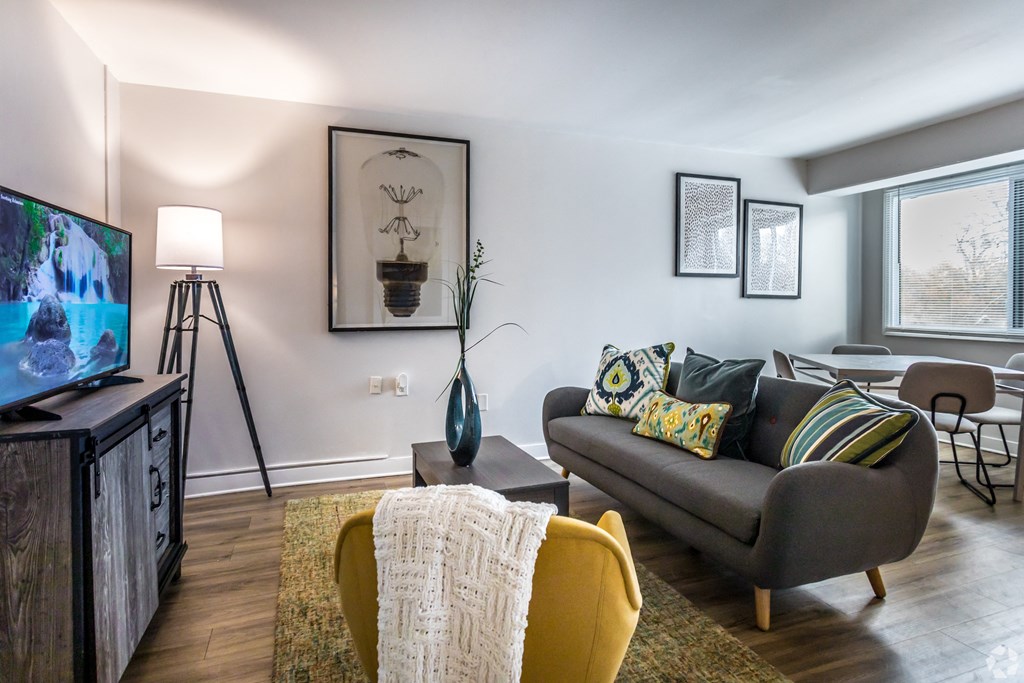 a living room with a couch and a tv