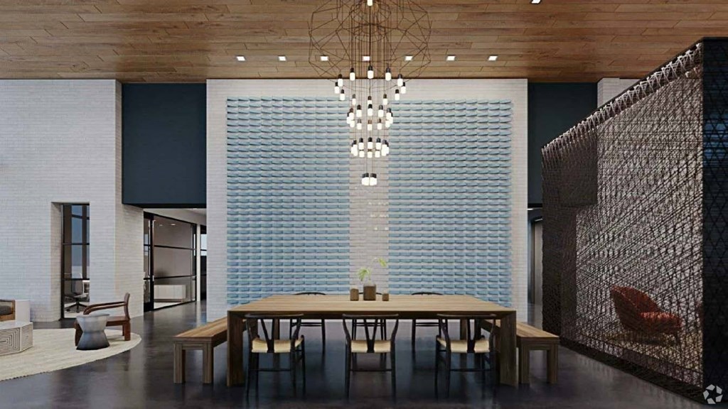 a large dining room with a large table and chairs and a wall with a curtain