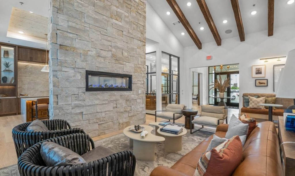 a living room with a couch and a fireplace