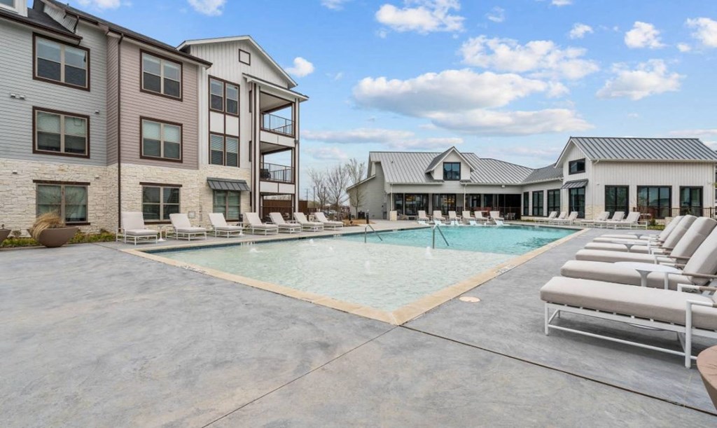 our apartments have a large pool with lounge chairs