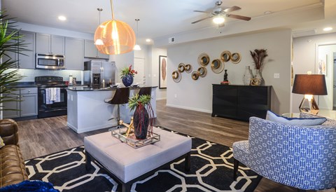 a living room with a couch and a table