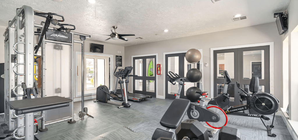 the residence on lamar apartment homes fitness room with exercise equipment