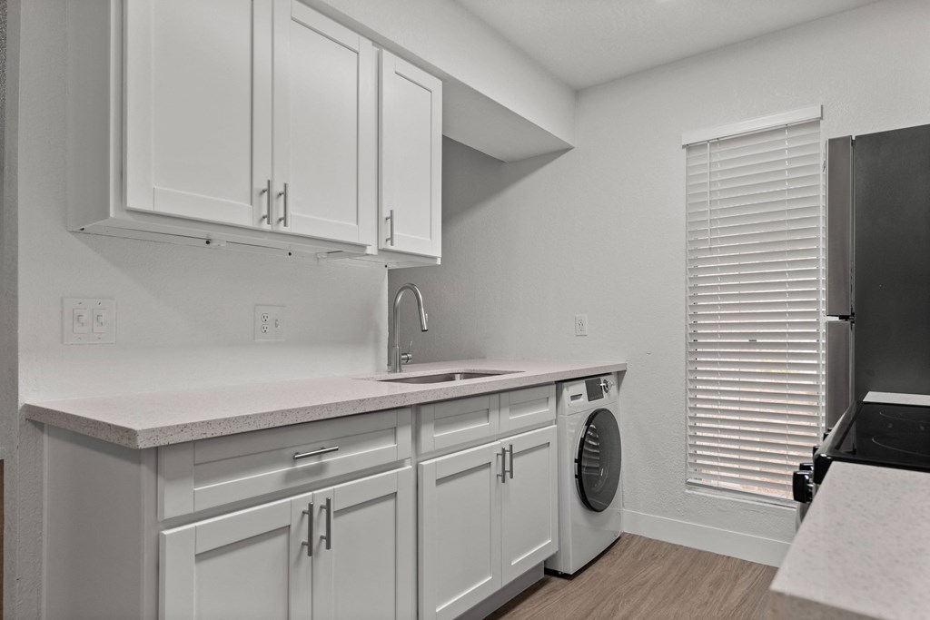the preserve at ballantyne commons apartment kitchen with washer and dryer