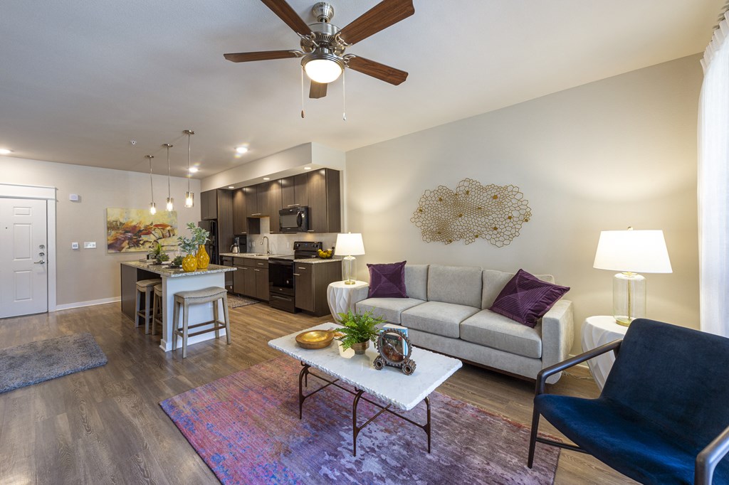 a living room with a couch and a table
