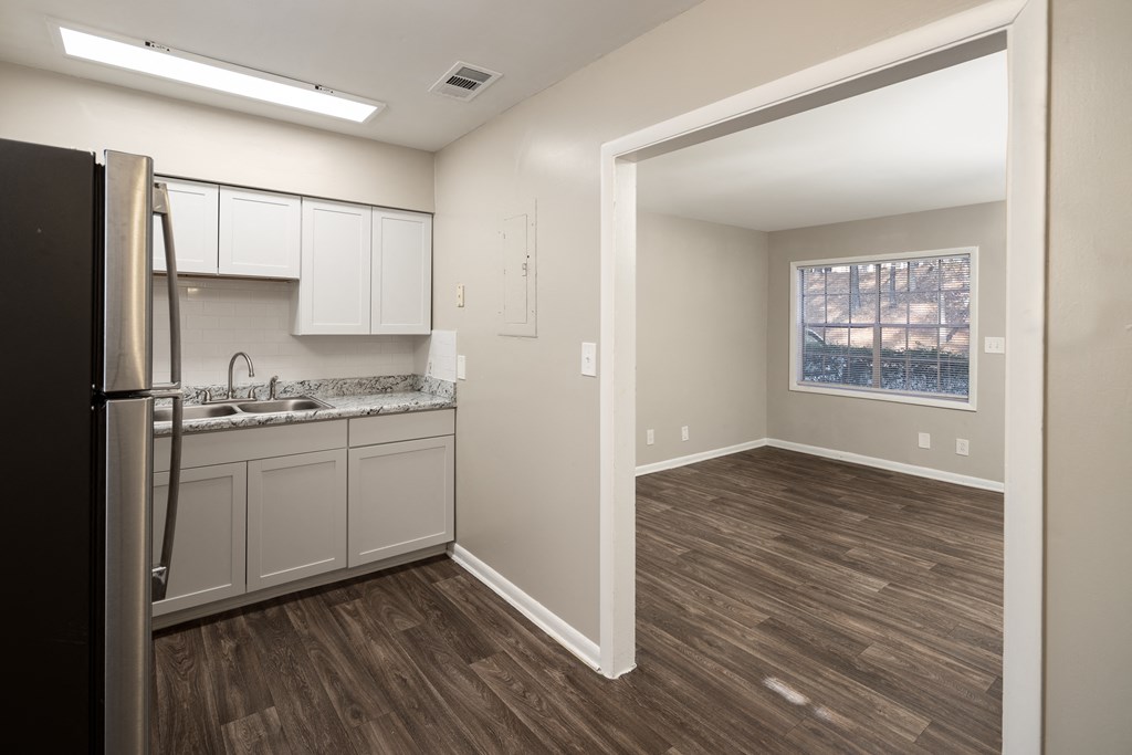 a kitchen and dining area in model unit