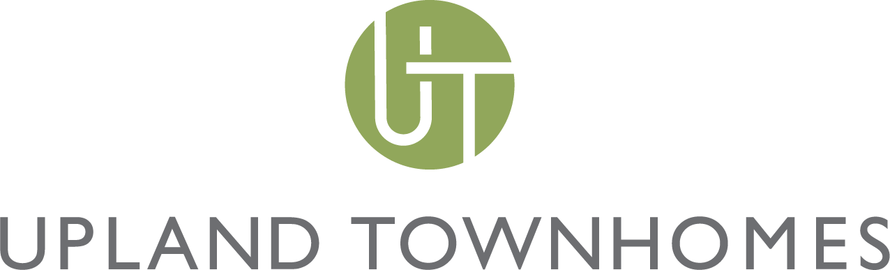 a green logo with the words upland townes