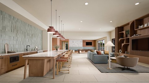 A modern kitchen with a long island and bar stools.