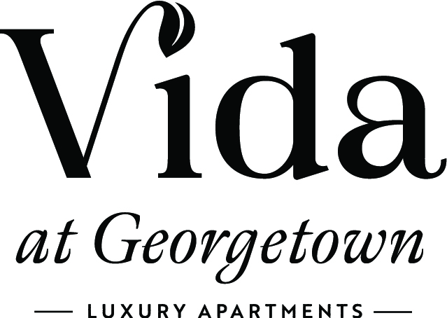 A black and white image of a logo for Vida at Georgetown Luxury Apartments.