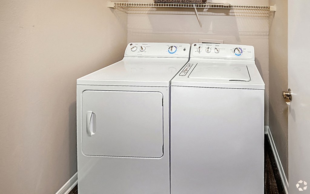 a washer and dryer in the laundry room of a home