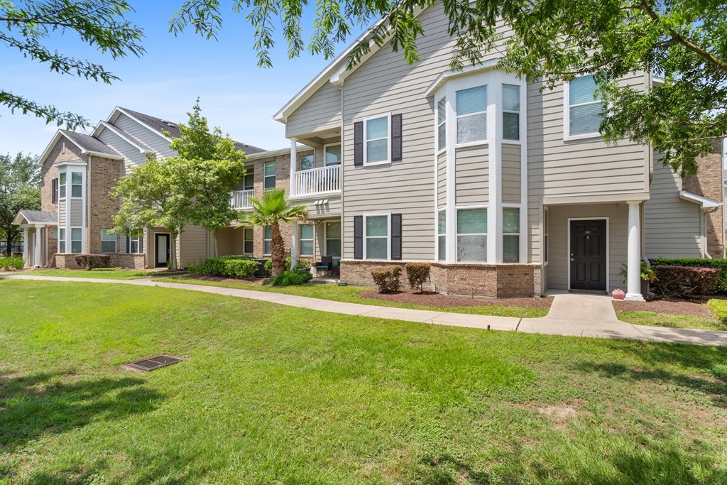 exterior of apartments with lawn area