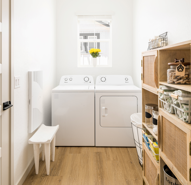 a small laundry room with a washer and dryer