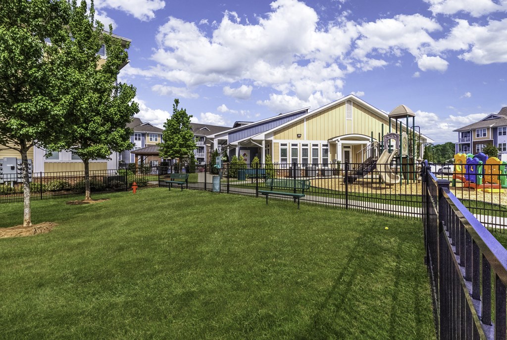 the preserve at ballantyne commons yard with a playground and fence