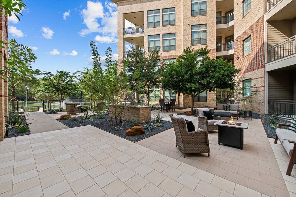 the preserve at ballantyne commons courtyard with furniture and trees