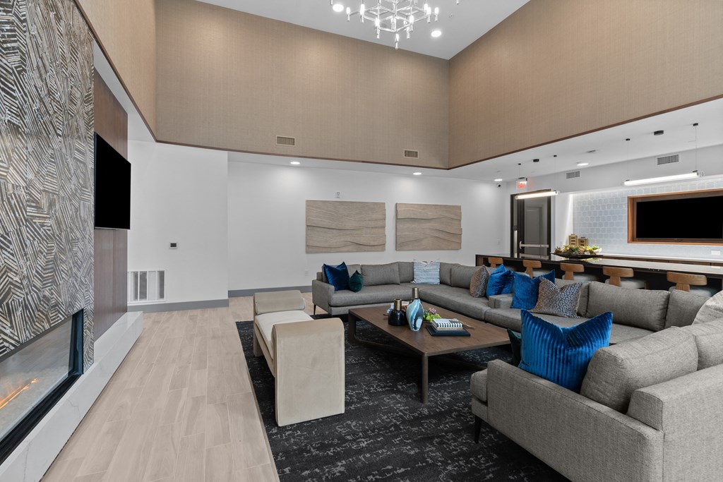 a large living room with couches and a coffee table