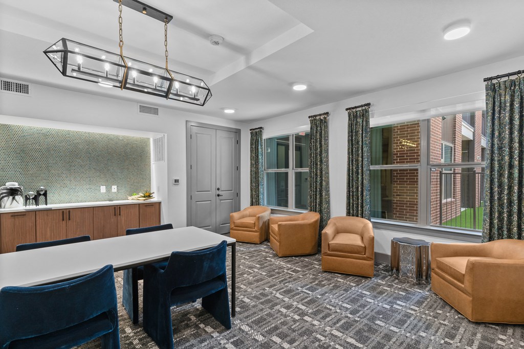 a conference room with a table and chairs