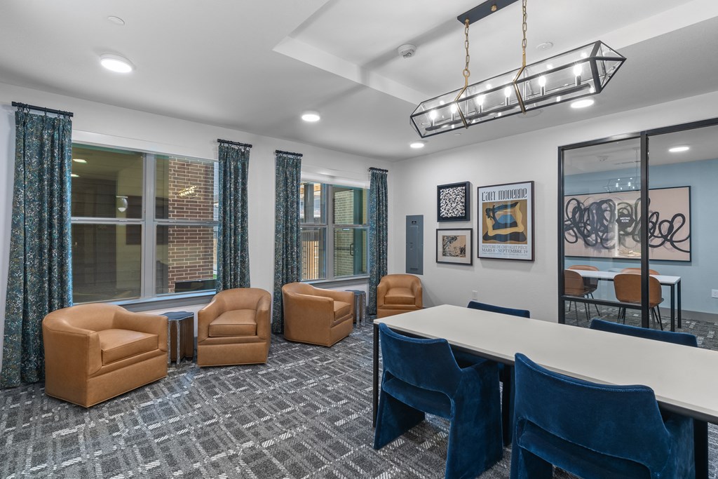 a conference room with a large table and chairs