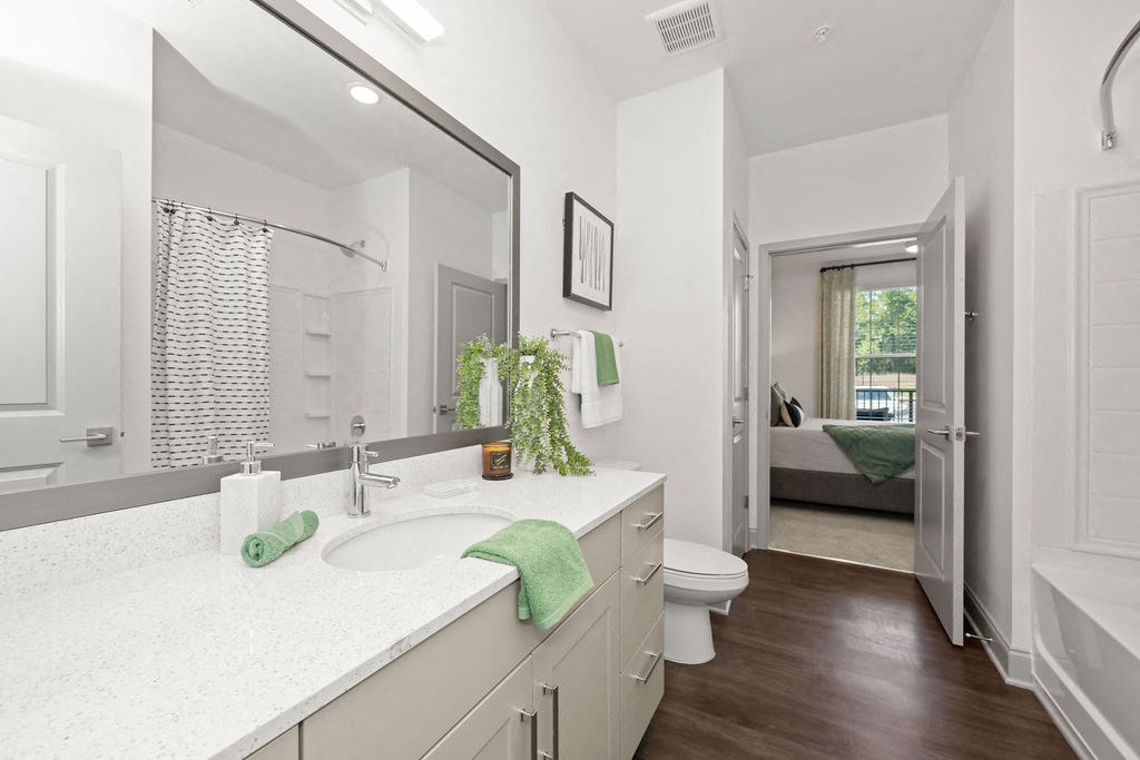 a bathroom with a large mirror