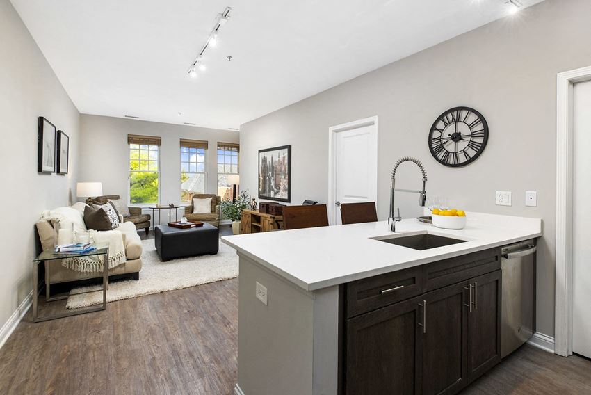 spacious open living room with sink