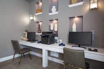 Business center with PC/Mac computers and printers