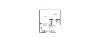 A floor plan of a small apartment with a bedroom, living room, and kitchen.