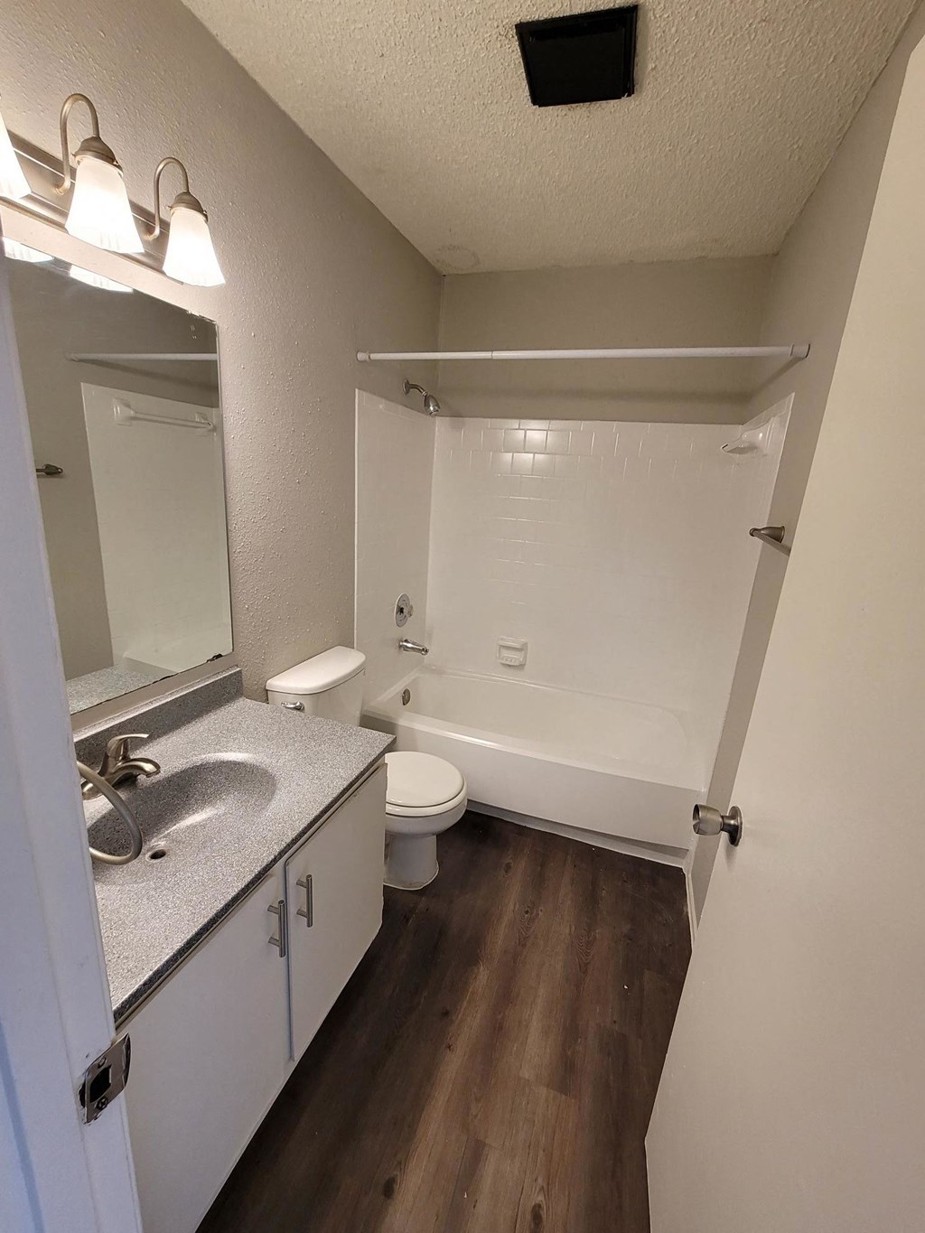 a bathroom with a sink and a toilet