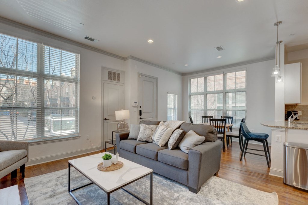 a living room with a couch and a table