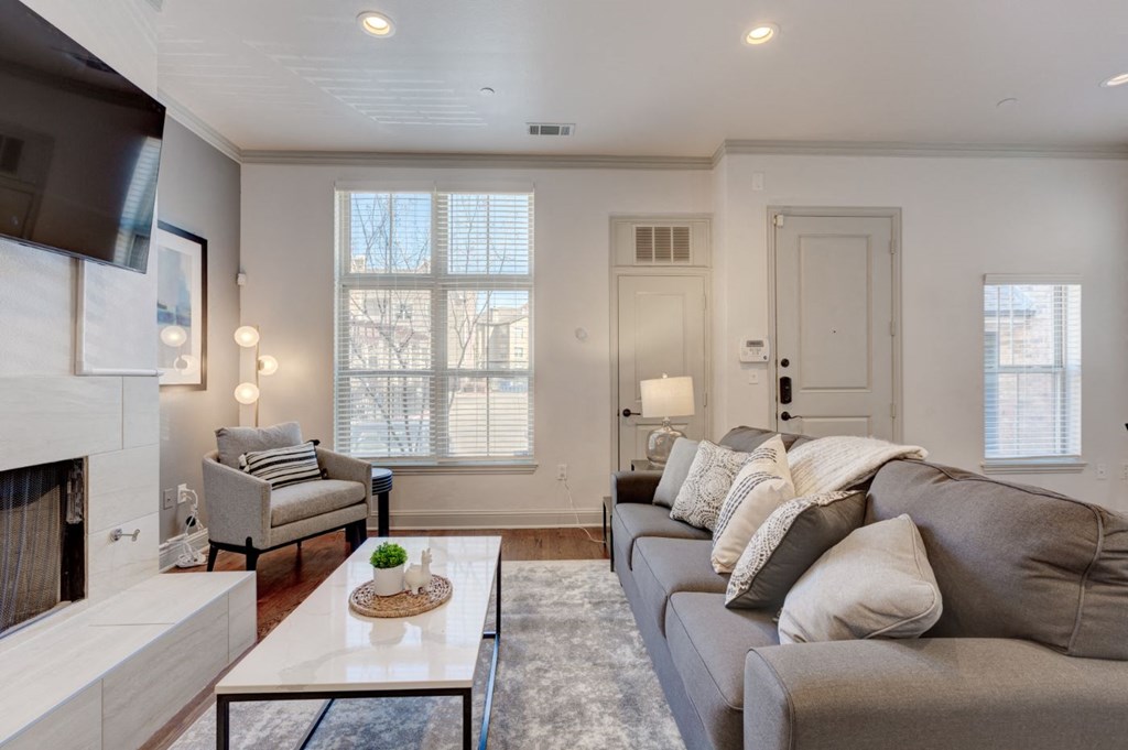 a living room with a couch and a coffee table
