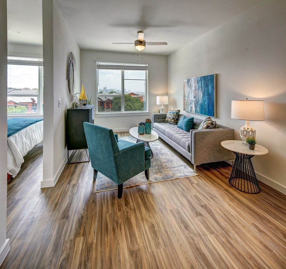 living room with beautiful green chairs at Brixton South Shore, Austin, 78741
