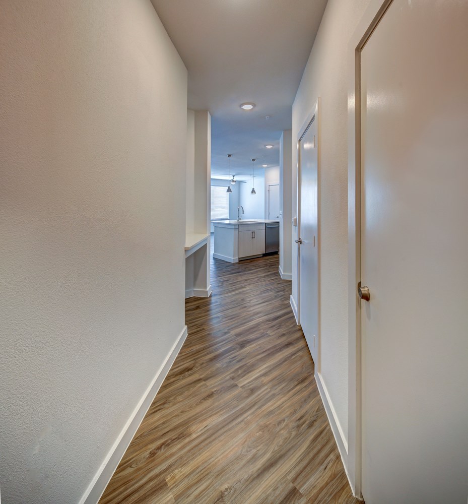 hardwood flooring in. the hallway at Brixton South Shore, Austin, TX