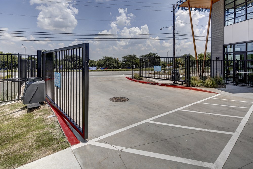 entrance to our parking lot at Brixton South Shore, Austin