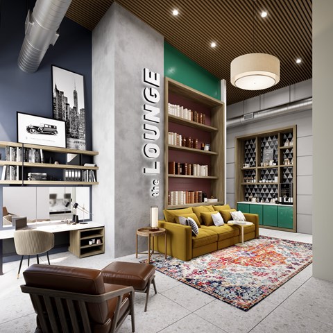 A modern lounge area with a sofa, chairs, and bookshelves.