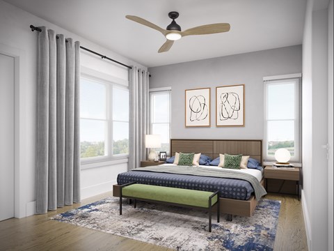A bedroom with a bed, bench, and two framed pictures on the wall.