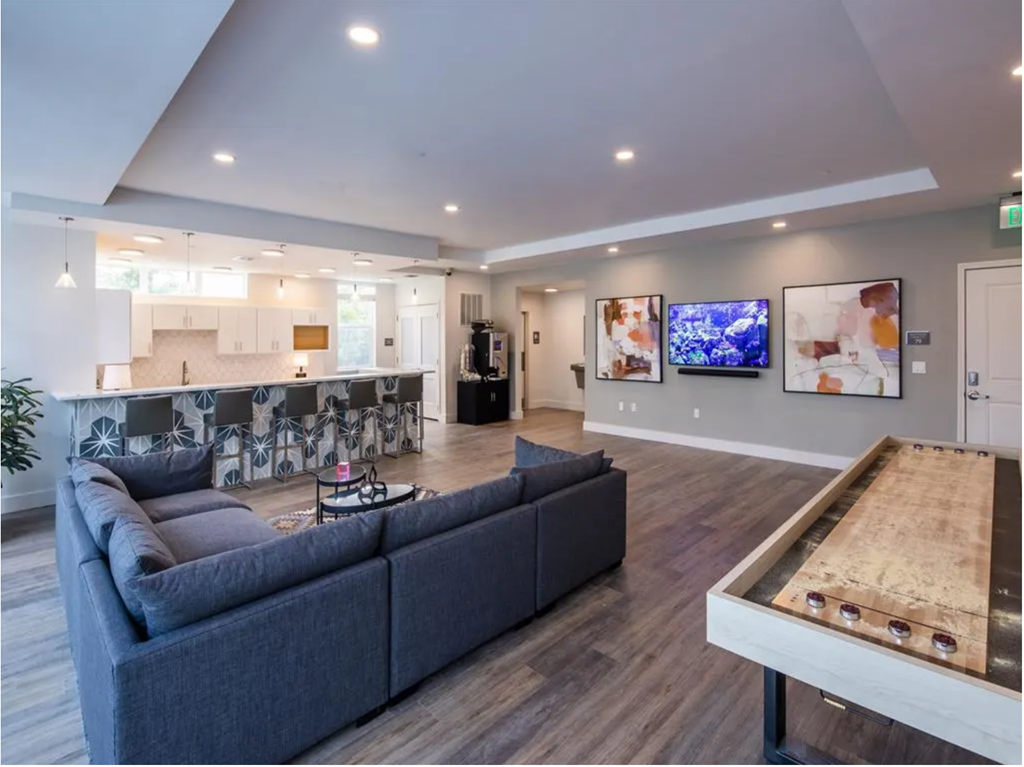 a living room with a couch and a table