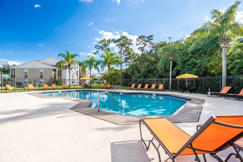 Outdoor pool with lounge seating