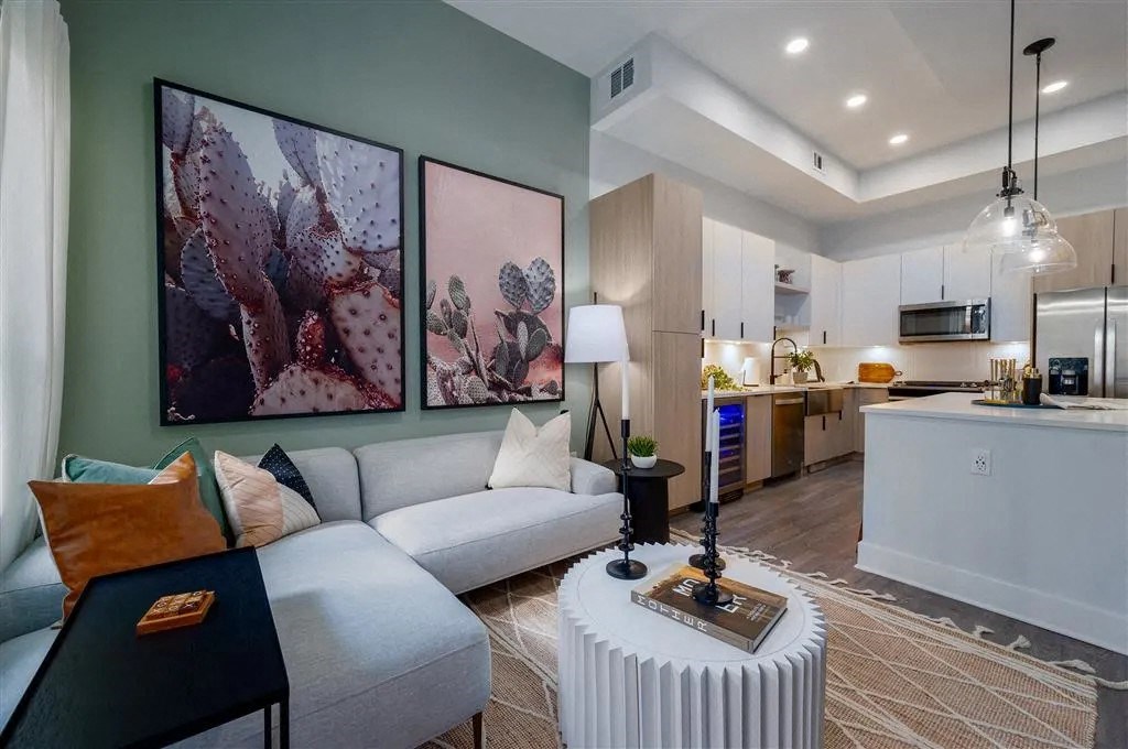 a living room with a couch and a table