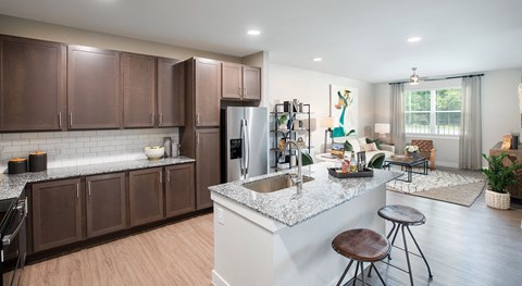 a kitchen with a counter top and a sink
