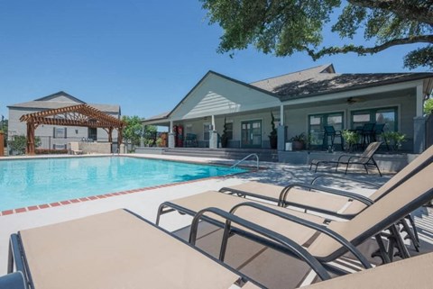 our apartments have a large pool and lounge chairs