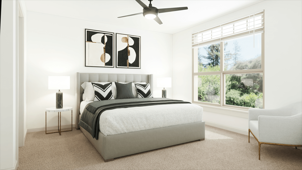 a bedroom with a bed and a ceiling fan