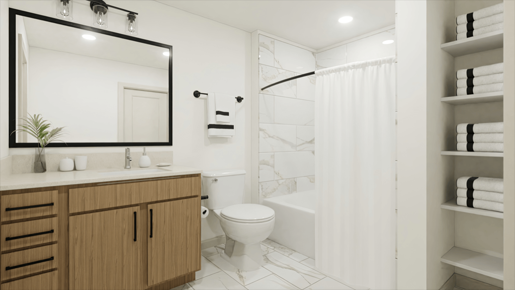 a bathroom with a shower and a sink and a toilet