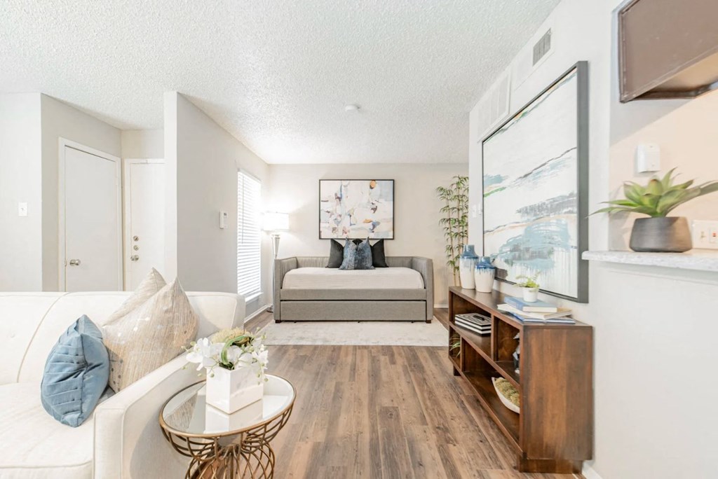 a living room with a couch and a coffee table
