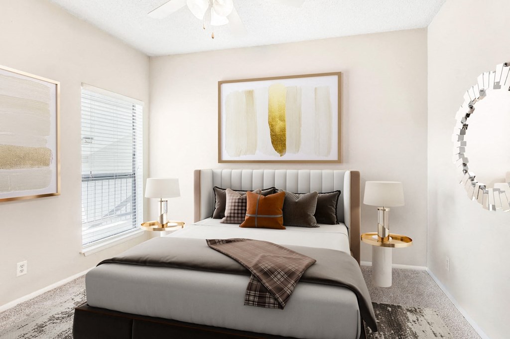 a bedroom with a bed and a window