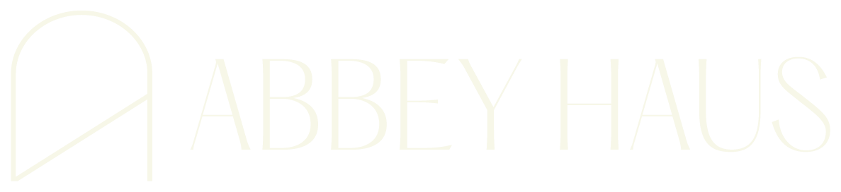The image features the word "ABBEY HAUS" in white letters on a black background.