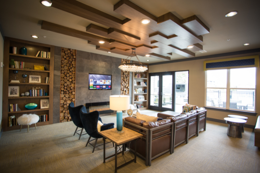 a large living room with coffered ceilings