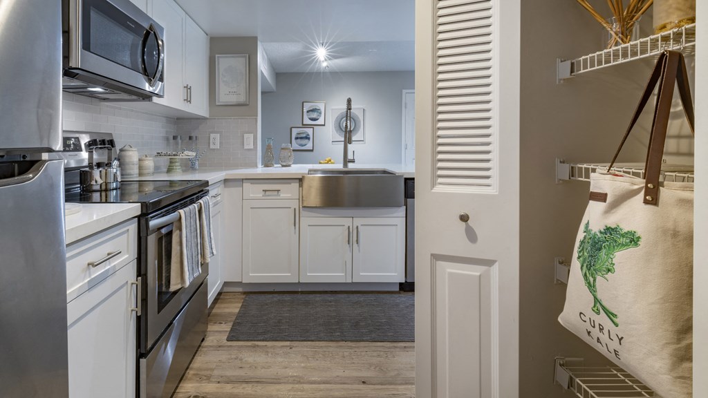 a view of a kitchen with a bunch of triangles on the floor