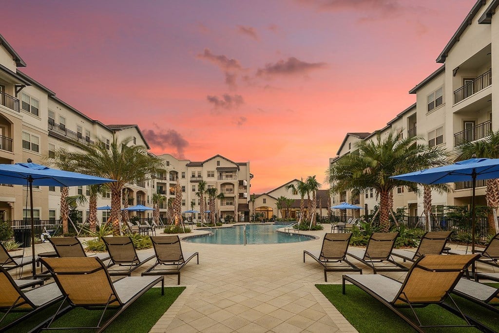 Outdoor pool at sunset